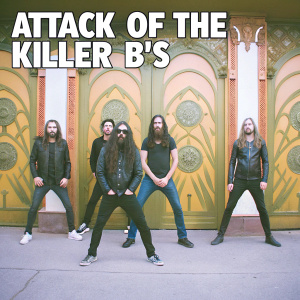 A group photo of the Anthrax band members, sporting long hair and dark outfits, posing together in a synchronized stance. The backdrop showcases intricate designs with the album title 'Attack of the Killer B's' prominently displayed.