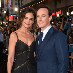Katie Holmes and Chris Klein at a bustling movie premiere. Katie in a black gown with intricate detailing, Chris in a navy blue suit. Crowds of fans and paparazzi in the background.