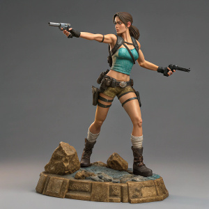 Highly detailed action figure of Lara Croft, holding dual pistols. Rock texture base, grey backdrop, figurine pose