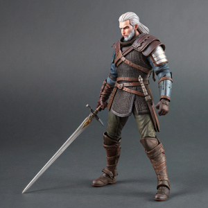 Action figure of Geralt of Rivia from The Witcher 3: Wild Hunt. Wearing detailed armor, ready to battle pose with sword. Neutral gray background