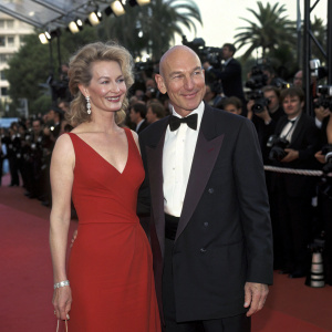 Wendy Neuss and Patrick Stewart at Cannes Film Festival premiere of 'Star Trek: First Contact'. Dressed in formal attire. Red carpet event.