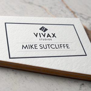 Professional business card for Mike Sutcliffe. Bold VIVAX Studios logo, crisp white background with black text, modern and sleek design.