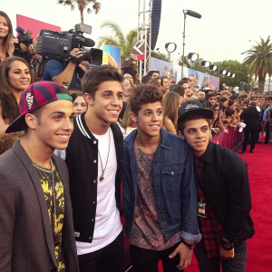 The Janoskians at the crowded MTV Movie Awards, surrounded by fans and celebrities.