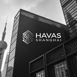 Modern logo design for 'Havas Shanghai'. Black background with abstract shapes and grayscale elements. Clean sans-serif font.