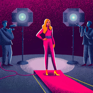 Heidi Klum, promoting her Dr. Scholl's DreamWalk shoes. Standing on a white carpeted stage, surrounded by camera flashes. The background is a bustling trade show.