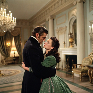 Clark Gable and Vivien Leigh embrace in the grand Tara plantation scene from 'Gone with the Wind'. Lavish interiors with antique furniture and rich decor.