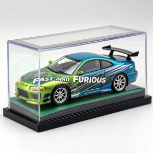 Limited edition Fast and Furious toy car. 1:43 scale, Brian's 1995 Mitsubishi Eclipse. Green and blue design, featuring the movie's iconic phrase. Clear window box display