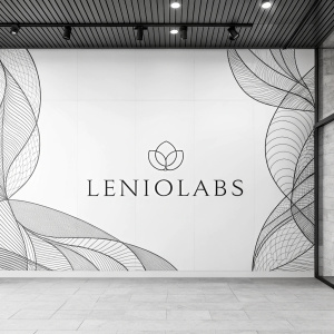 Leniolabs logo, sleek and modern design on a stark white backdrop with abstract sketches in grayscale tones.