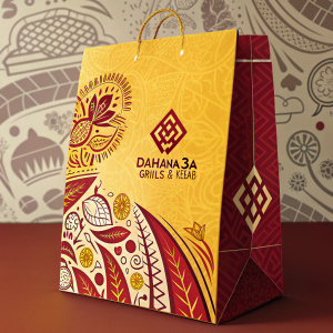 Digital art of a packaging design for Dahana3a Grills & Kebab. Bold yellow and red colors, detailed patterns, eye-catching