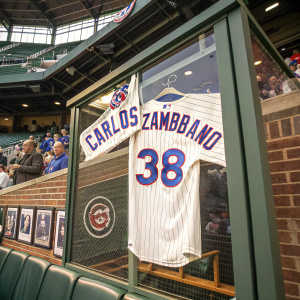 Carlos Zambrano's retired jersey, number 38, displayed at Wrigley Field during Cubs home game.