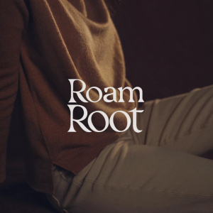 Roam Root logo design featuring a minimalist sans-serif font in white, centered on a soft pastel green backdrop.