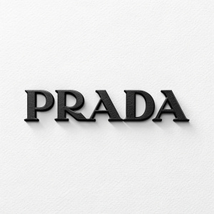A sleek, high-definition image of a logo featuring the word 'PRADA' in a bold, sans-serif font. Dark letters on a white background. Central alignment within the frame,占据大部分图像空间。代表奢侈时尚品牌的风格。