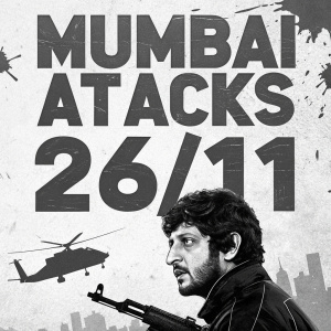 Poster for 'Mumbai Attacks: 26/11'. Graphic design with bold text and imagery of a determined man's face, rifle, and helicopter silhouette. Black and white with blocky shapes and splatters.