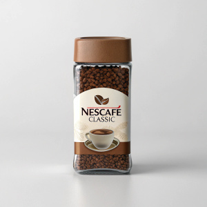 Nescafé Classic instant coffee, sleek and modern packaging design. Glass jar, brown lid, dark brown coffee granules, featuring a minimalist coffee cup and beans logo. Clean and recognizable brand style.