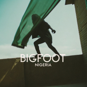 A dynamic logo for Bigfoot Nigeria featuring a swift-moving, gorilla-like figure with the text 'Bigfoot Nigeria' written in a sleek, modern font. The design employs a stark contrast between the dark silhouette of the creature and a vivid yellow backdrop, emphasizing strength and boldness.