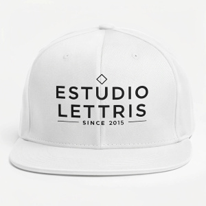 The Estudio Lettris logo features sleek, minimalist typography on a crisp white backdrop. The text 'Estudio Lettris Since 2015' in bold black font, high contrast
