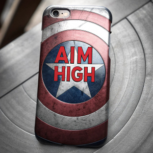 Close-up of iPhone case featuring Captain America's shield design. Bold text 'Aim High' in red. Grey scale background.