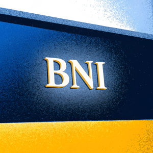 Modern logo for BNI, sans-serif font, acronym 'BNI' with trademark symbol. Dark grey background.