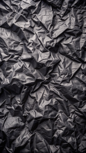 craft crumpled black paper background