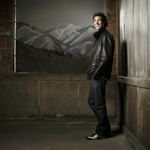 Eric Balfour at the Sundance Film Festival, wearing a stylish black leather jacket and jeans. Backdrop is a snowy mountain range.