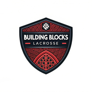 Vector art of logo for Building Blocks Lacrosse. Shield shape, black and red hues, detailed geometric motifs. 'Building Blocks Lacrosse' text in bold font. Modern and sleek design.