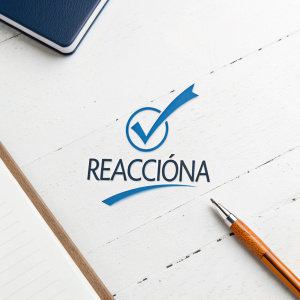 Logo design featuring a blue checkmark above the text 'Reacciona'. Clean, minimalist white background.