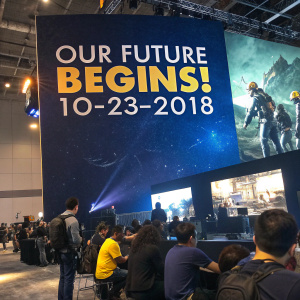 GameStop in Makati City hosts Fallout 76 launch event. Large promotional poster with dark blue background. 'Our future begins!' and '10-23-2018' prominently displayed. Gathering of gamers and fans.