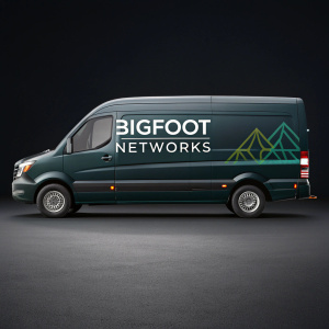 Render of Bigfoot Networks van. Sleek, modern design. Professional and polished look. Dark background. Logos and contact info prominently displayed.