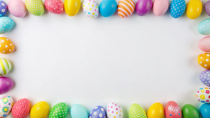 Easter banner with colorful Easter Egg double side border over a white background. Top view with copy space.