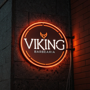 The Viking Barbearia logo. The brand name is boldly featured in a sleek, modern font. Dark background with neon orange accents.