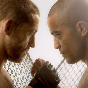 Conor McGregor and Jose Aldo, staring intensely at each other in the UFC octagon. Stark white background with UFC branding.