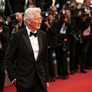 Richard Gere, looking dapper in a black tuxedo, graces the Cannes Film Festival red carpet.