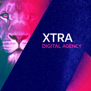 A logo design for XTRA Digital Agency. Stylized lion's head in angular, geometric shape. Modern and sleek look. Lion's head central, text 'XTRA Digital Agency' to the right in contemporary font.