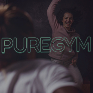 Modern logo for PureGym featuring vibrant green typography and a playful fitness icon on a crisp white backdrop.