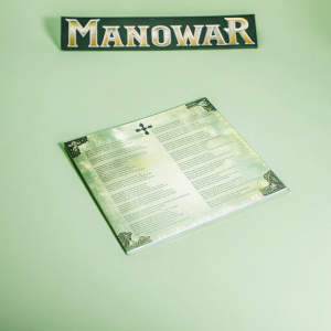 Front cover of the Manowar album 'Manowar'. Blue and black design with bold band name at the top. Tracklist, producer, and production company credits visible. Heavy metal aesthetic