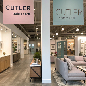 Cutler Kitchen & Bath and Cutler Modern Living. Large, stylish signs in pastel tones. Modern interior design showroom.