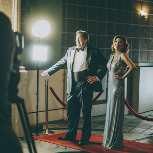 John Goodman and Annabeth Hartzog at the Hollywood premiere of 'Stella'. Wearing elegant attire, standing beside each other.