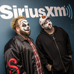 Shaggy 2 Dope and Violent J from Insane Clown Posse at SiriusXM. Wearing clown makeup, casual wear. Standing in front of SiriusXM logo backdrop.
