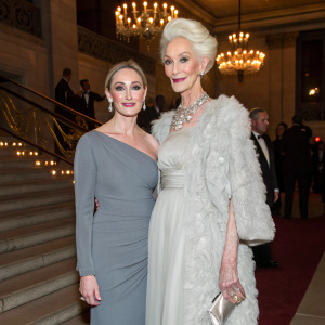 Pietra Brettkelly and Carmen Dell'Orefice, attending a gala at the 2018 Tribeca Film Festival. Pietra in a gray dress, Carmen with a blonde updo.