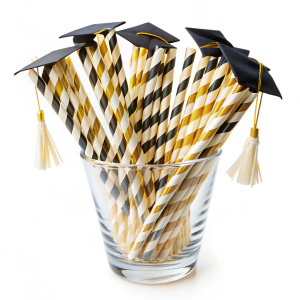 graduation straws in fancy glass on white background 