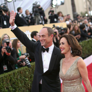 Christopher Meloni and Lilly Tartikoff at the celebrity gala. Surrounded by flashing cameras and fans.