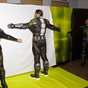 A detailed 3D model of a futuristic character from HyperScape. The character is shown in various dynamic poses, with arms outstretched, against a plain black backdrop.