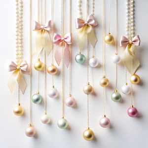 simple hanging ribbons and beads on white background top view 