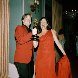 Jeff Daniels and Kathleen Treado celebrating their win at the HBO party. Golden Emmy Award in hand.