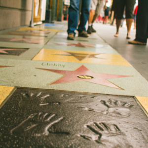A detailed shot of a celebrity handprint and footprint on the Hollywood Walk of Fame. Located near TCL Chinese Theatre.