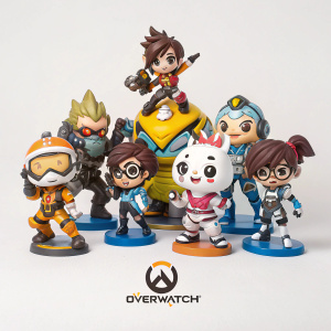 Overwatch characters arranged in an energetic pose, set against a plain background, with the Overwatch logo subtly placed at the bottom