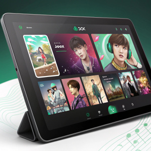 Digital interface of Joox music streaming platform, featuring a playlist of K-pop songs.