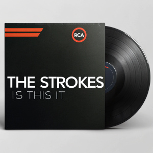 Close-up of a sleek black album cover for 'The Strokes' titled 'Is This It'. RCA logo prominently displayed at the top.