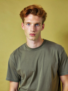 Comfort Colors 1717 pepper color with hex code #5F605B blank t-shirt, slightly oversized fit, gorgeous white German man with green eyes, and tousled auburn hair, in his  early 20s, bright natural overcast lighting, exterior setting, Clean sharp focus, naturalistic style photography by Richard Billingham and Sergi Pons 