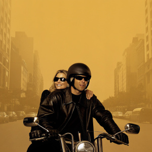 Christie Brinkley and Olivier Chandon cruising down a busy city street on a motorcycle.